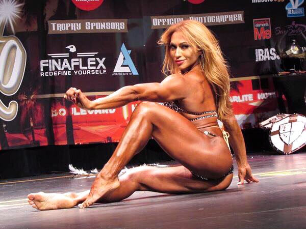 Karina Nascimento doing her routine on stage for the crowd